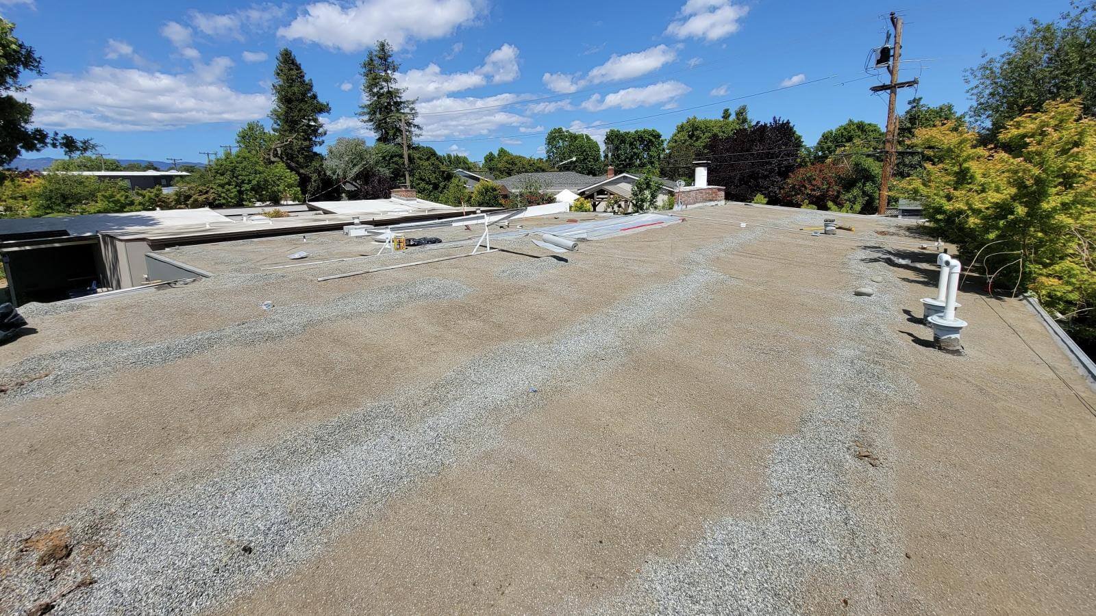 Recent spray polyurethane foam roofing installation on a warehouse
