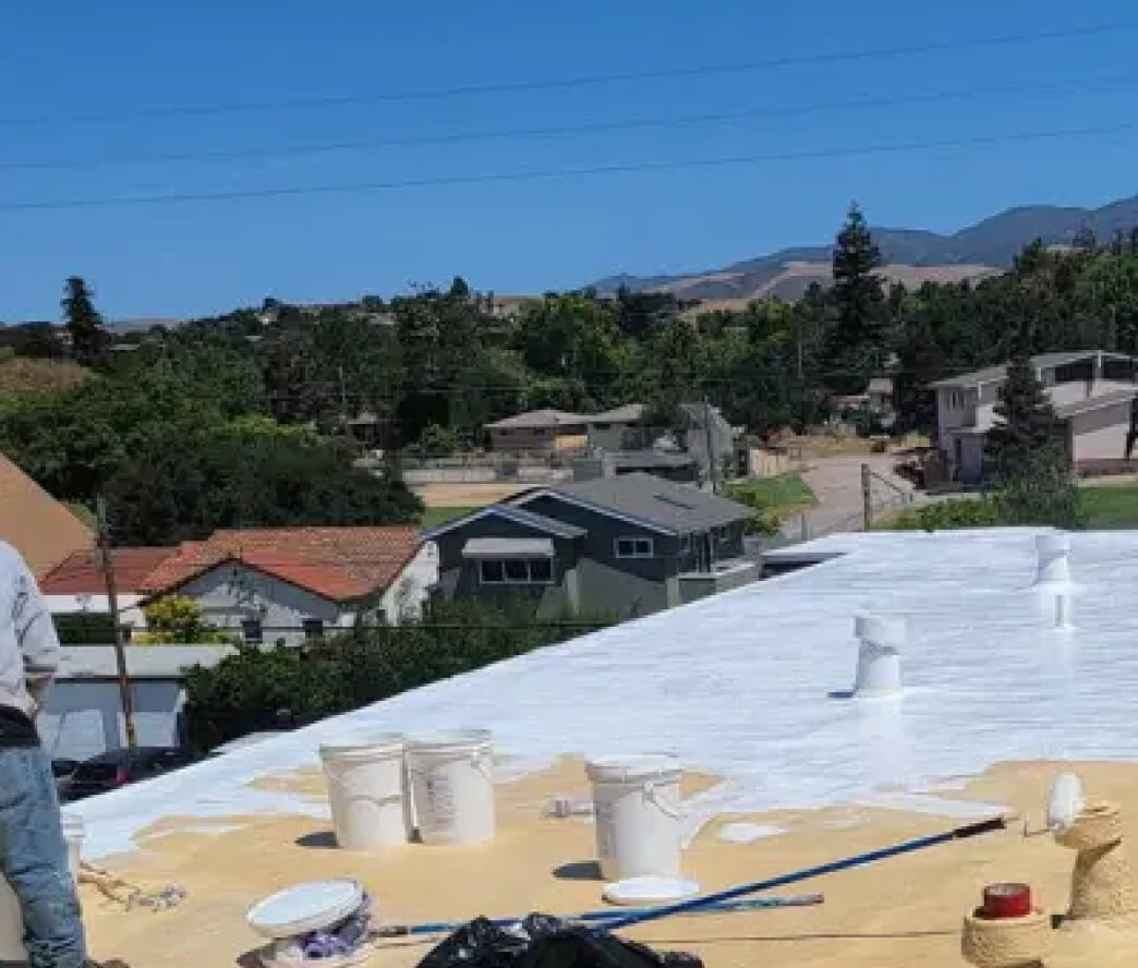 Spray polyurethane foam roofing system installed on a commercial flat roof