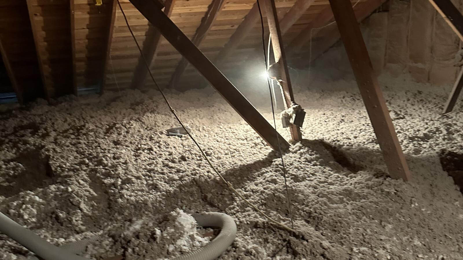 Dense-pack blown-in insulation in an older home's walls