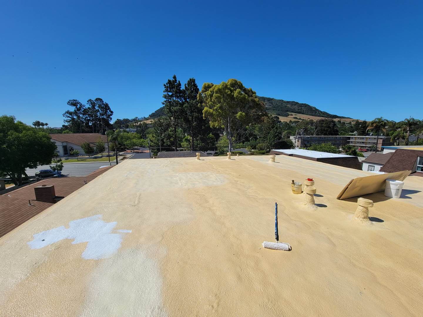 Polyurea waterproofing coating applied to a flat roof