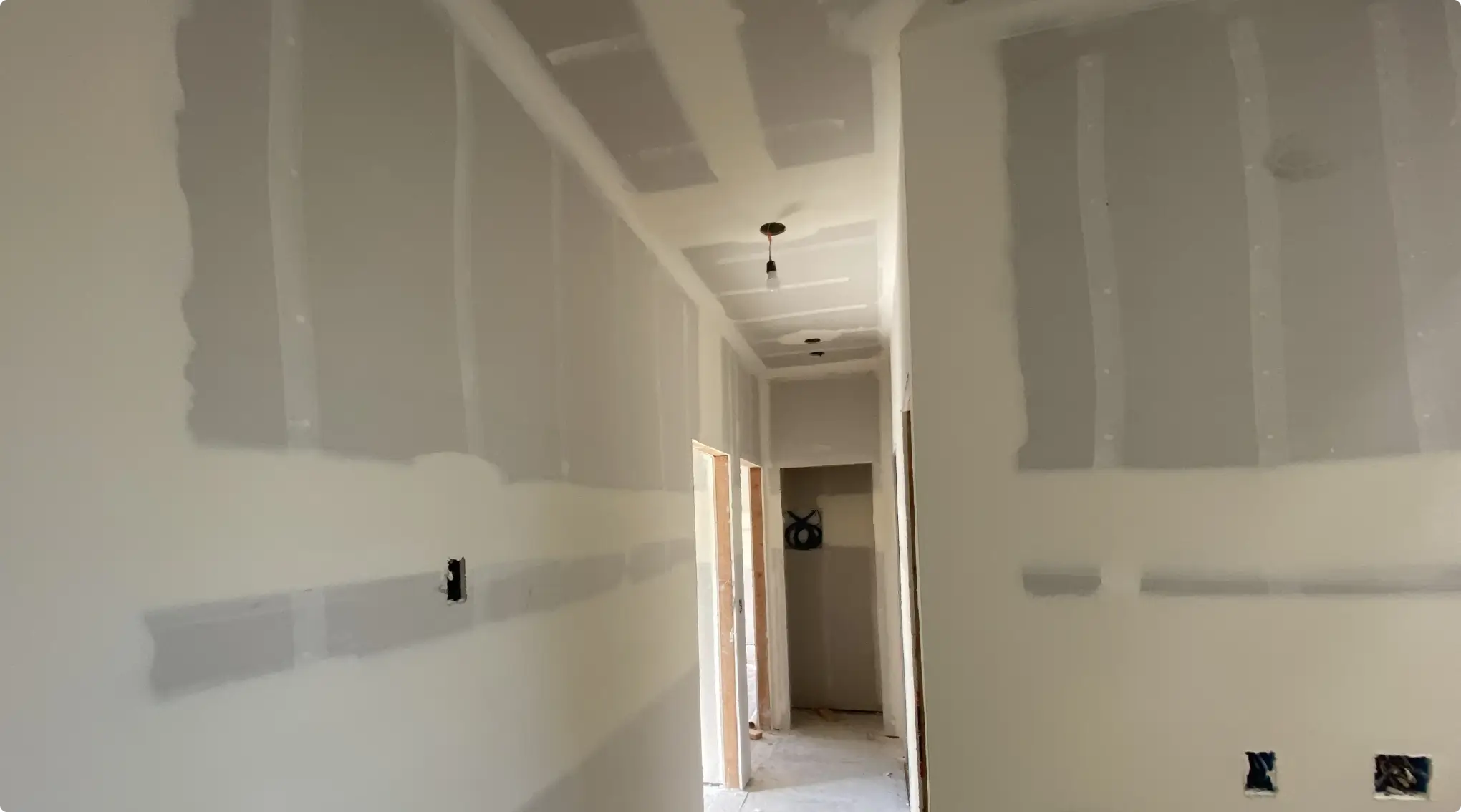 Suspended ceiling grid being installed in a commercial space