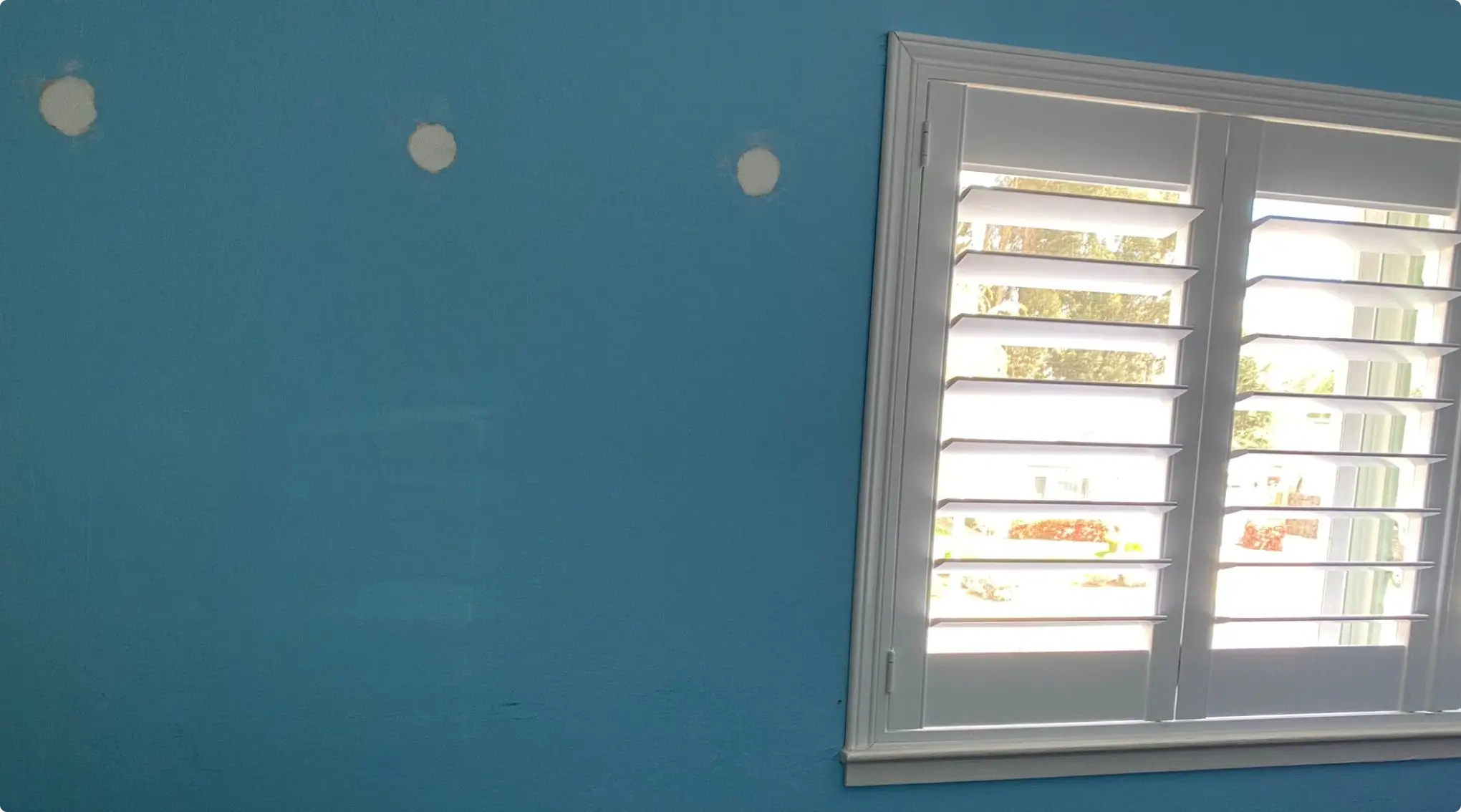 Ceiling tiles cut around lighting and HVAC registers