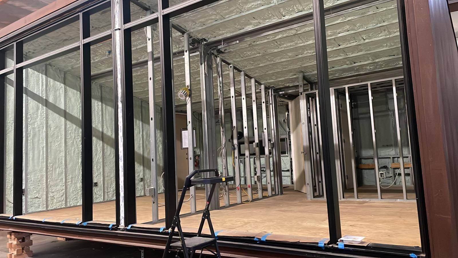 Closed-cell spray foam insulation applied to the walls of a commercial building