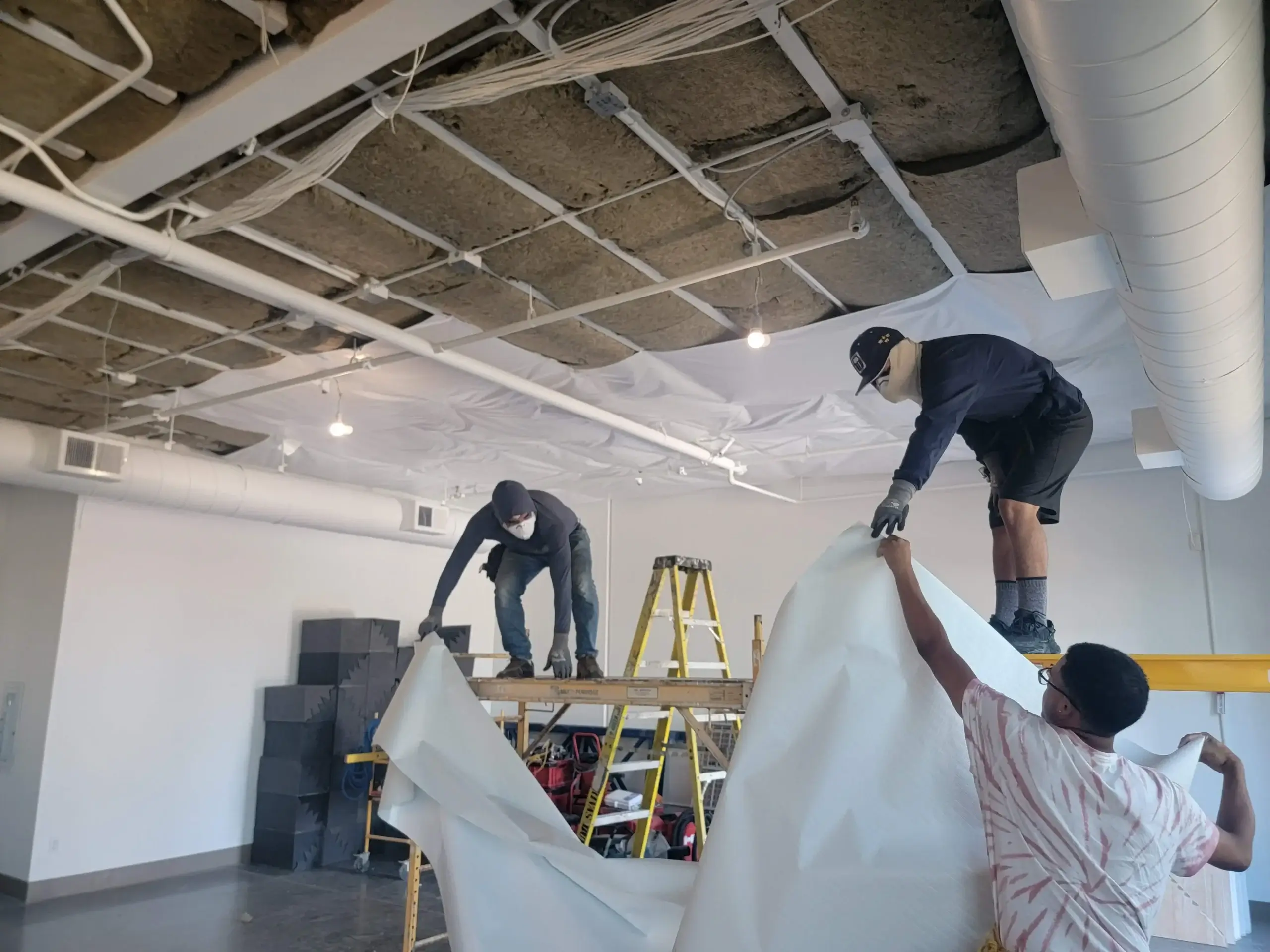 Soundproofing insulation installed in interior walls of a San Francisco condo