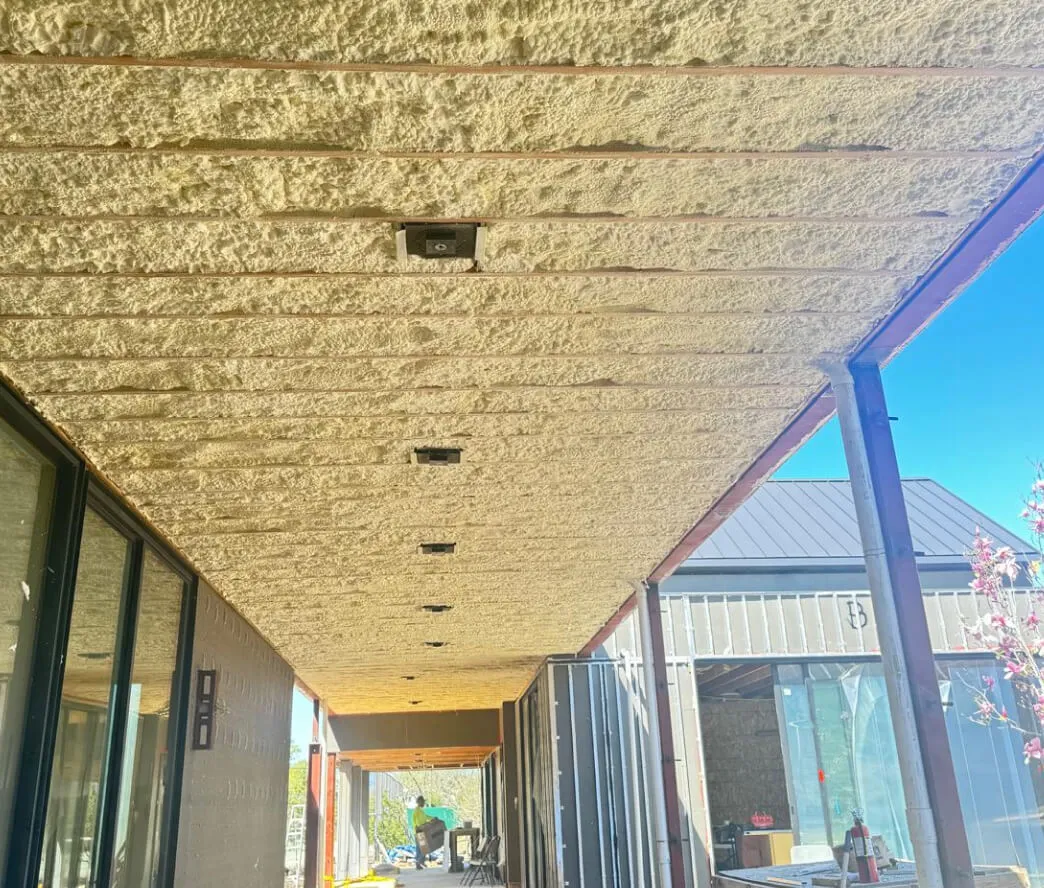 Closed-cell foam sealing a crawl space foundation wall